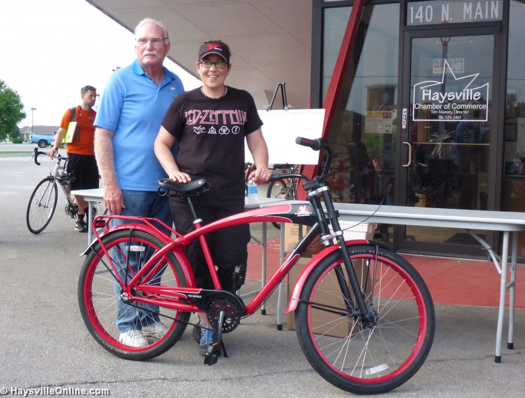 The Mayor and the winner of the bike.