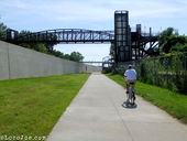 Riverfront Heritage trail and pedestrian  bridge across it.